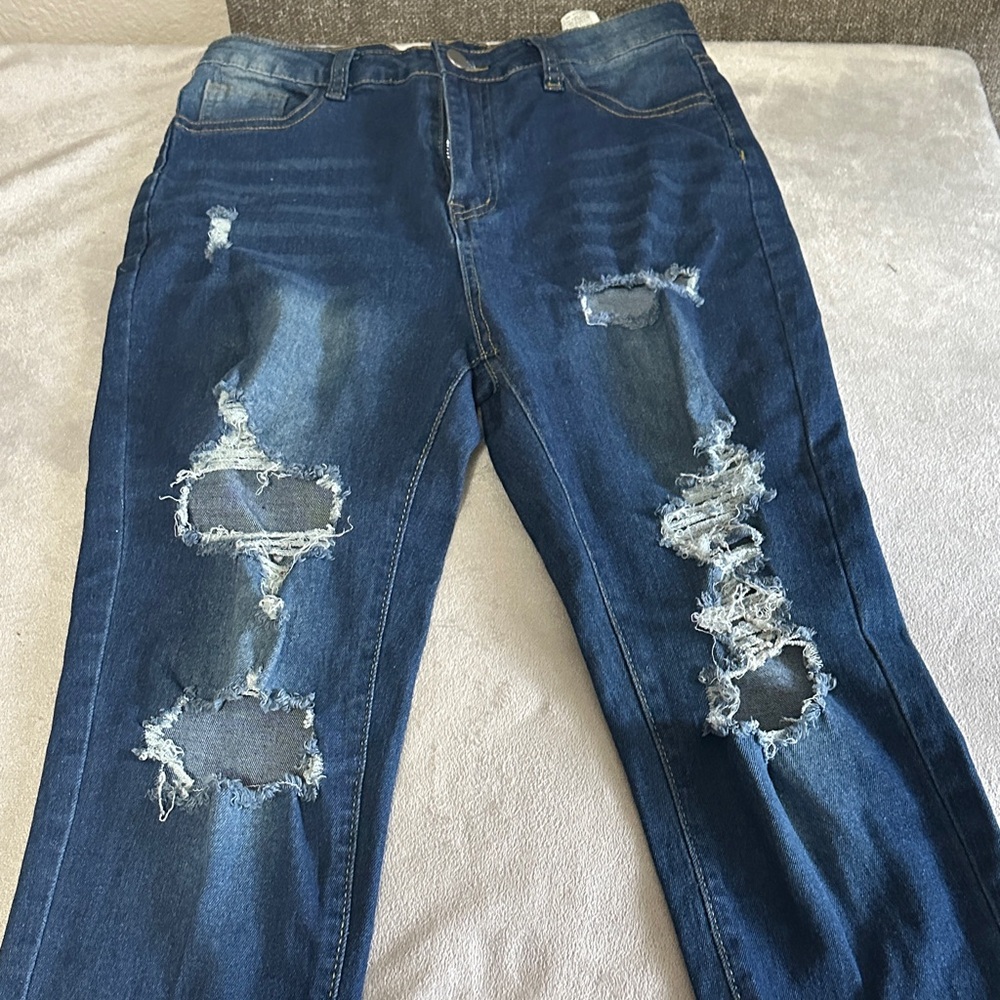 Distressed Blue Jeans